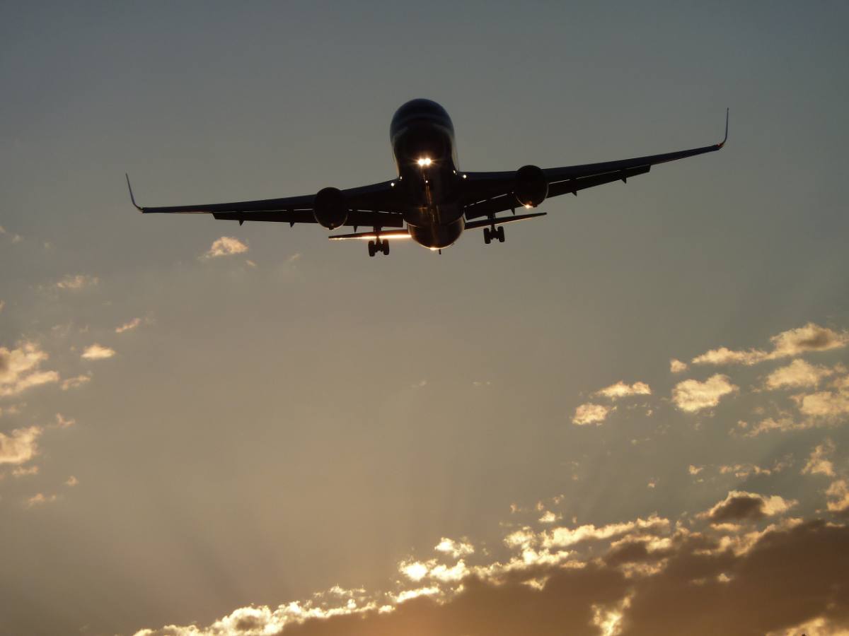Aircraft on final approach at dusk